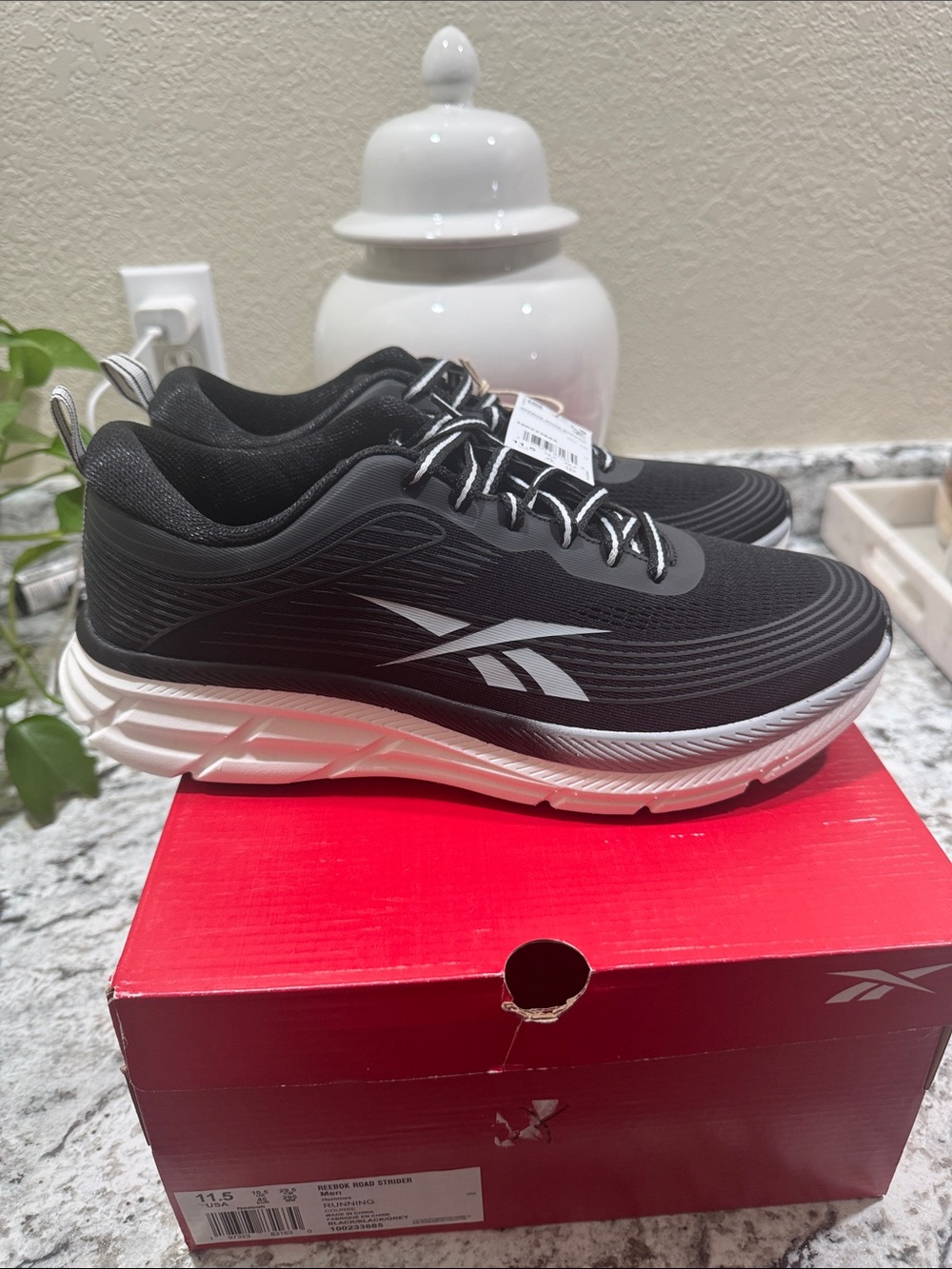 Reebok Men’s Black and White Cushioning Sneakers